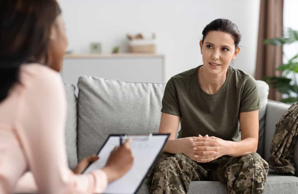 A female veteran shares her service experience during veterans rehab in Philadelphia.