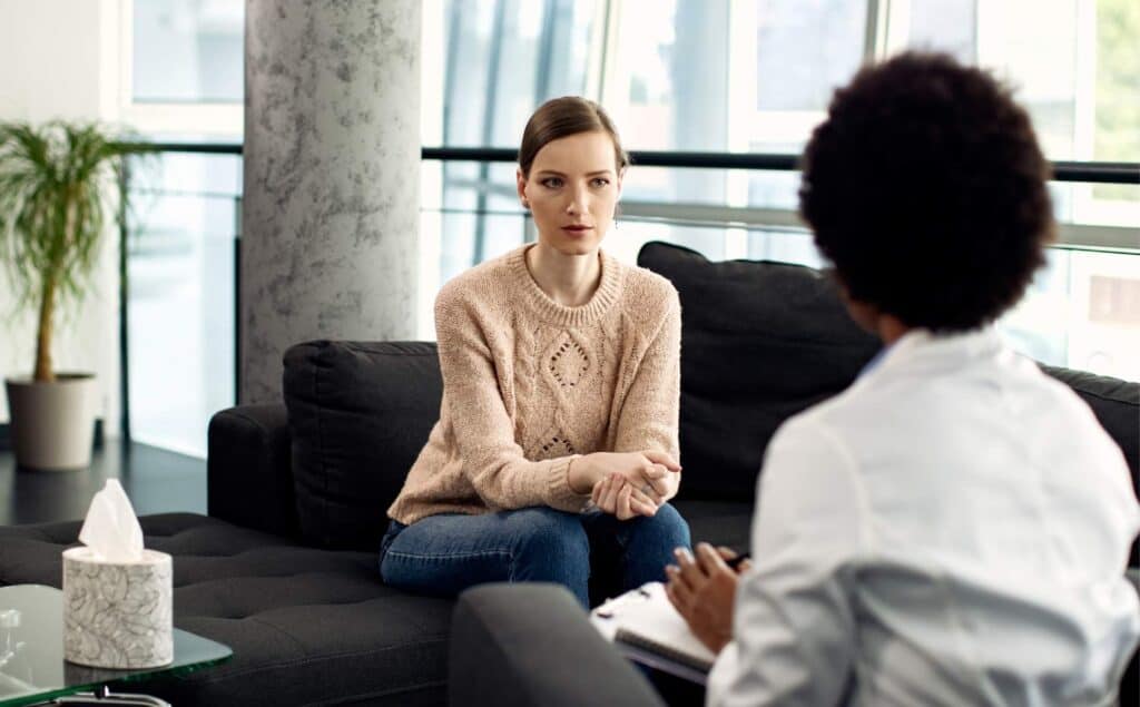 Woman focused in a session of dialectical behavior therapy in Philadelphia.
