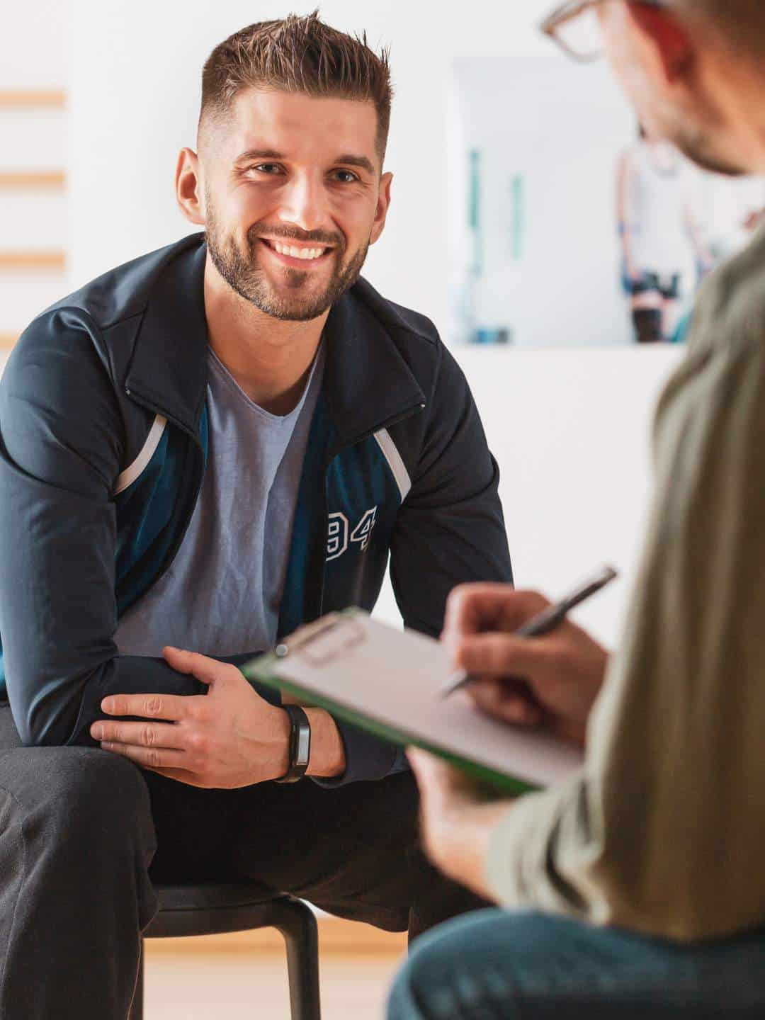 Man in a therapy session for addiction recovery.