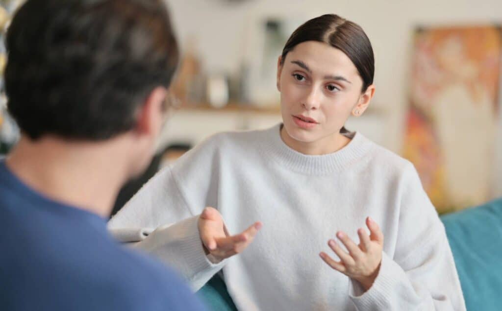 Professional discussing misconceptions about cocaine addiction with a client.