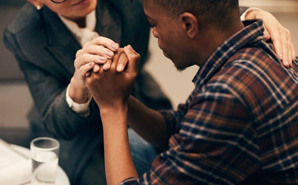 Man getting emotional support during Philadelphia cocaine addiction treatment.