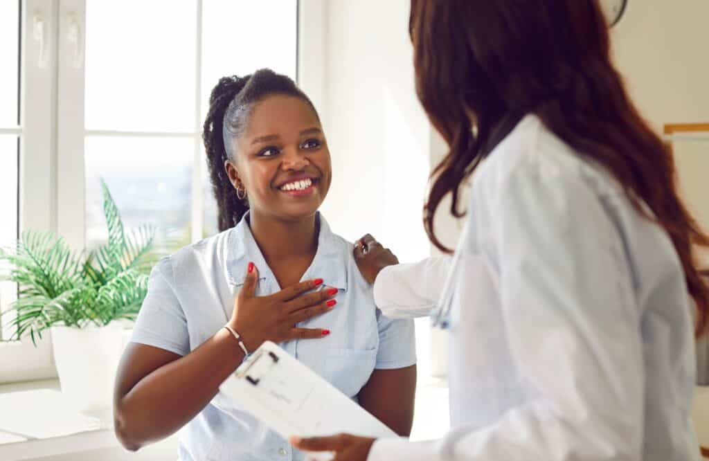 A woman talks to her doctor during Philadelphia methamphetamine addiction treatment.
