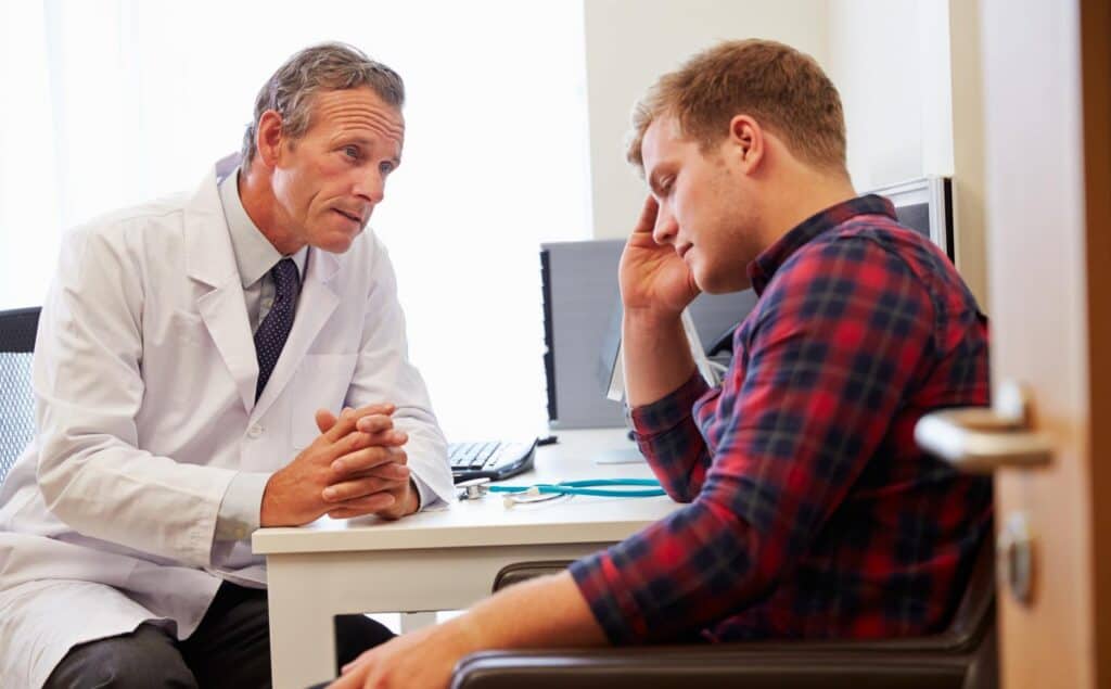 Doctor helping a patient with withdrawal at an MDMA rehab in Philadelphia.
