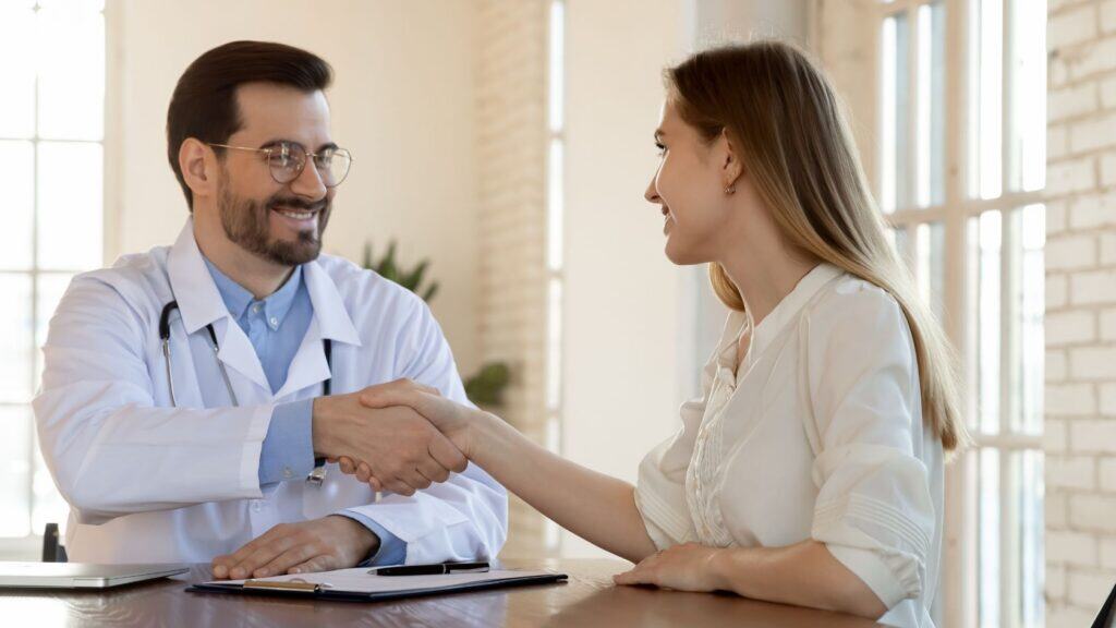 Patient meeting with a doctor to go over insurance details for stimulant rehab in Philadelphia.