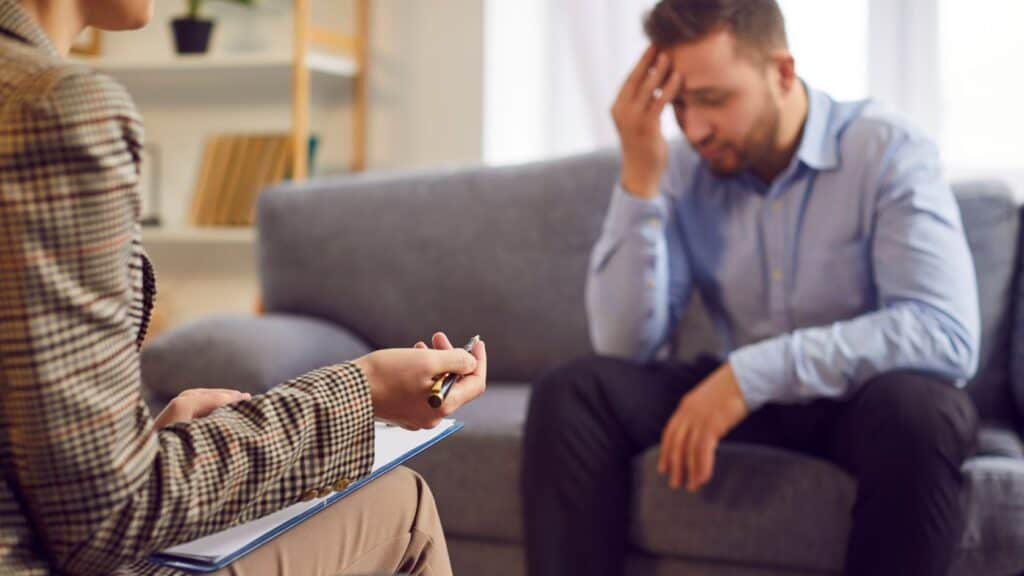 Man engaged in a one-on-one counseling session at a stimulant rehab in Philadelphia.