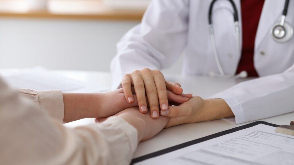 Doctor providing comfort and guidance to a patient at a stimulant rehab in Philadelphia.