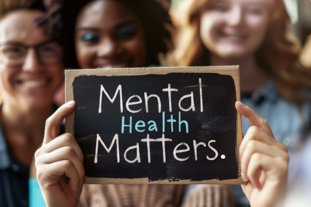 People holding a sign saying mental health matters for mental health treatment program in Recovery Homes